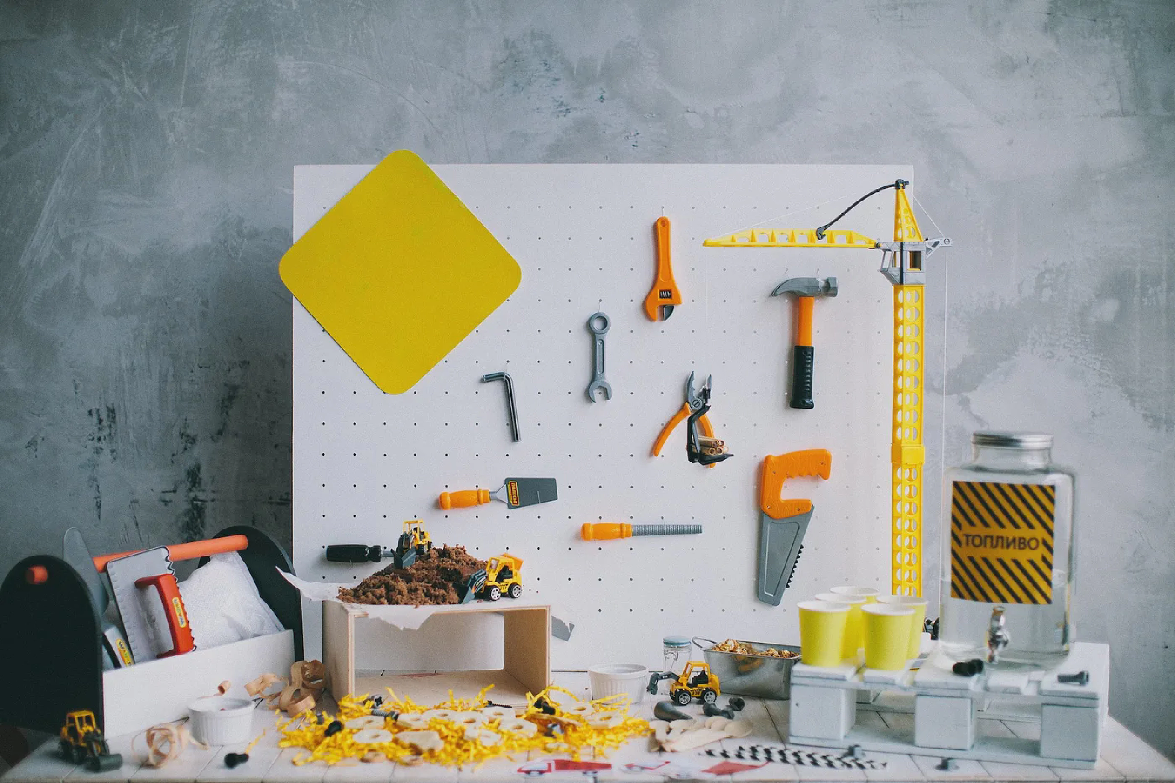 a visual collection of different tools stacked against a wall